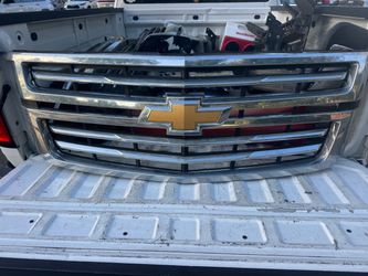 Chevy front grills an black emblems oem parts