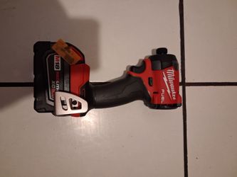 Milwaukee fuel  impact w battery. Firm price