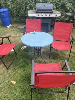 Round Table Four Red Chairs 