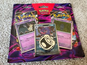 Pitch black and chaos rising . Pokémon TCG Blister Pack with Promo Cards