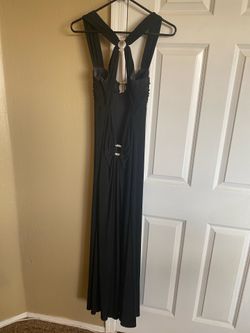 Elegant black Cache evening gown in size 6