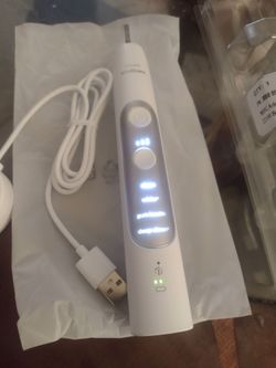 Phillip sonicare electric toothbrush 7500 price is firm $75 new