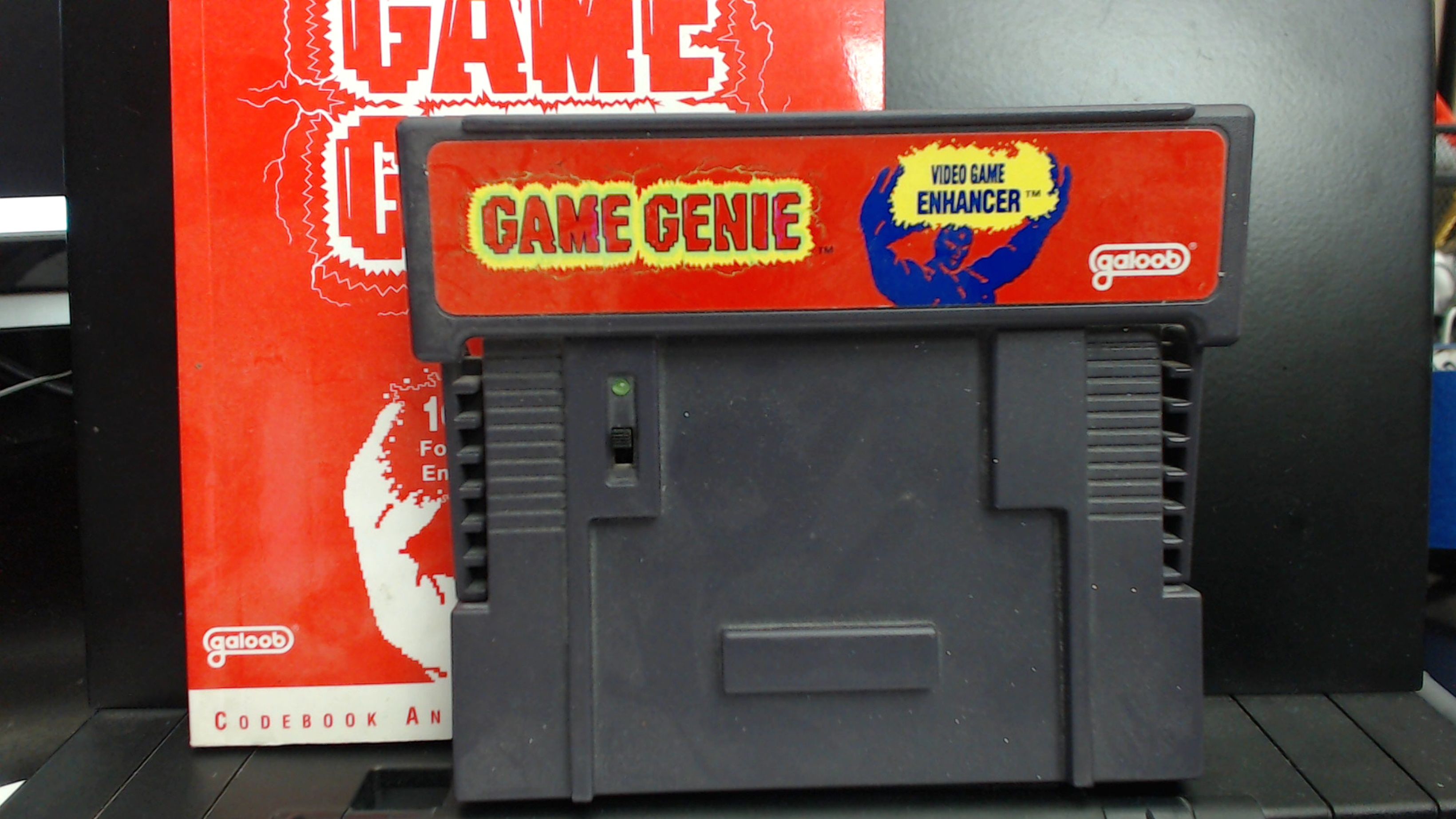 GAME GENIE - (Super Nintendo, SNES) - Cartridge and Manual. CHEAT CODES - UNLOCK EVERYTHING - GAMESHARK - ACTION REPLAY