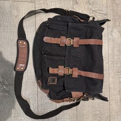 Stylish and durable cloth and leather messenger bag