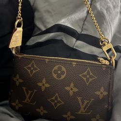Authentic Louis Vuitton Mini Pouchette
