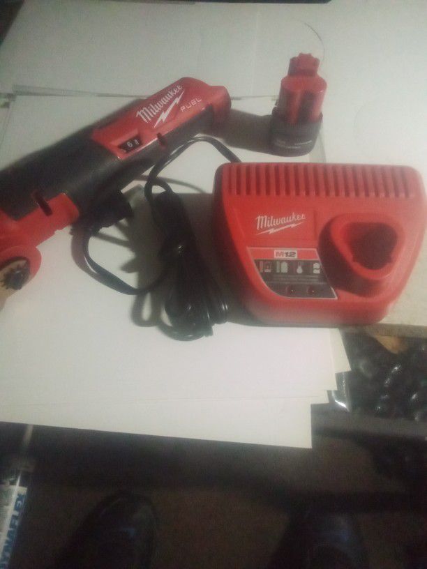 Milwaukee Fuel M12  Multi Tool  with Battery And Charger