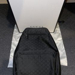 Gucci GG Logo Canvas Backpack
