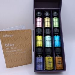 doTERRA Essential Oil Case Plus NEW Natrogix Bliss Essential Oil 9 Pack & Books