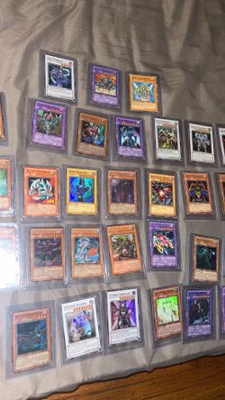 Yugioh cards/ binder/ (both mint and moderate to heavy play)