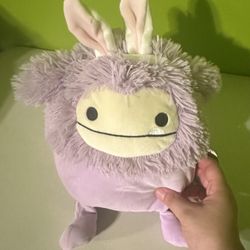 Dilka the Bigfoot with bunny ears purple Squishmallows stuffed animal