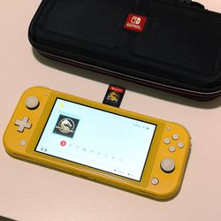 Nintendo Switch Lite + Mortal Kombat 11 , 128gb Memory card and a Case