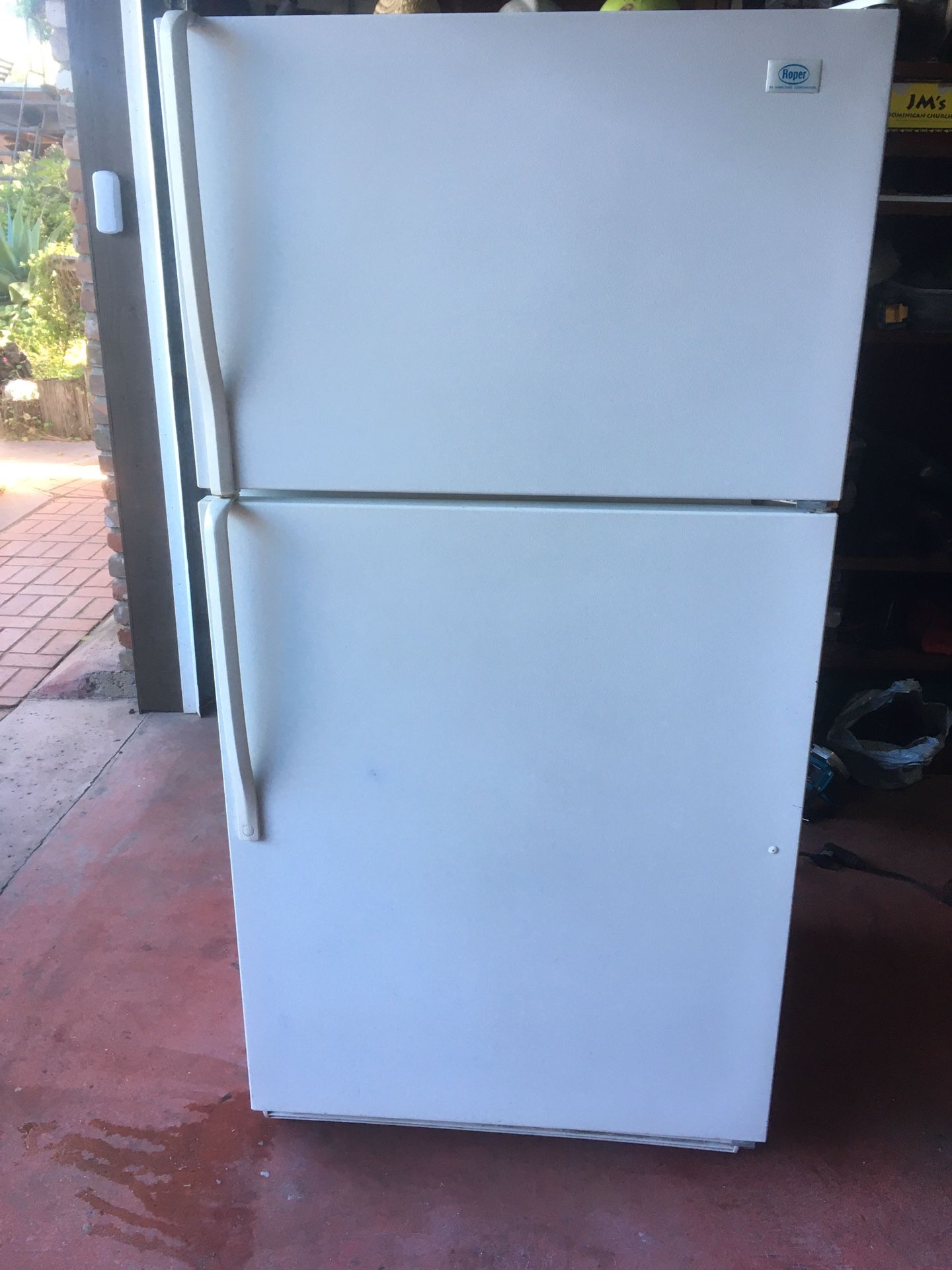 Nice clean working refrigerator with top freezer