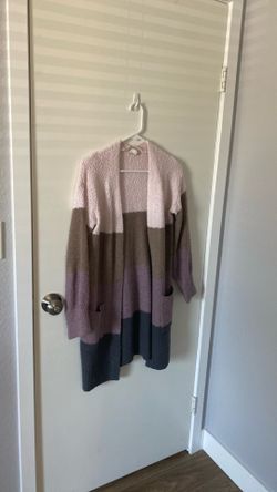 Woman’s sweaters and tops
