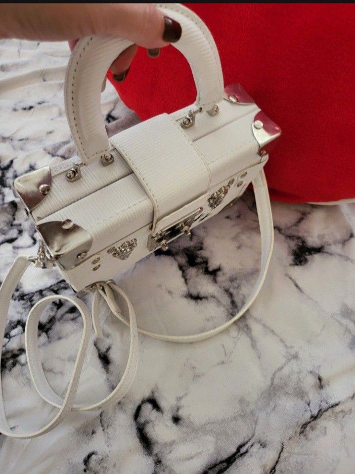 👜