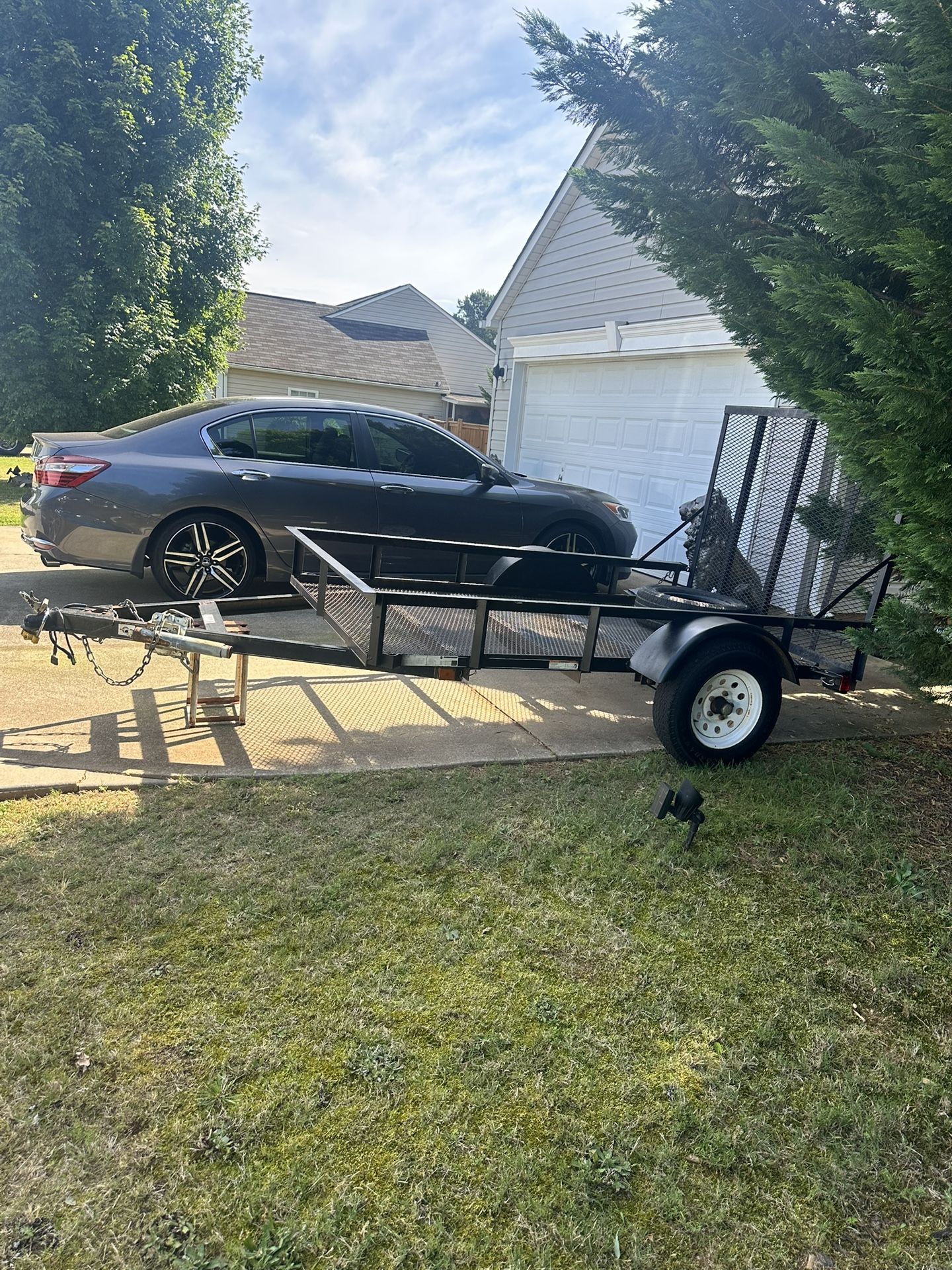 5X8 HEAVY DUTY DOVETAIL UTILITY TRAILER.