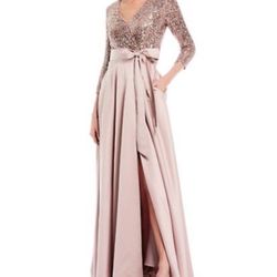 XScape 2/4 Sleeve https://offerup.com/redirect/?o=U2VxdWluLlRvcA== Satin Ball gown.Mauve 12 Size 6