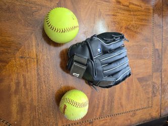 Softball Glove with Two Softballs