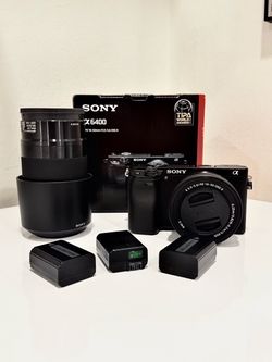 sony a6400 with 2 lenses and extra batteries