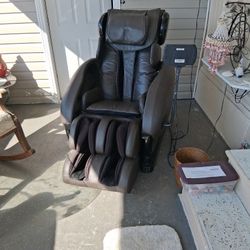 Electric massage chair with Bluetooth music. And air squeezing your muscles.