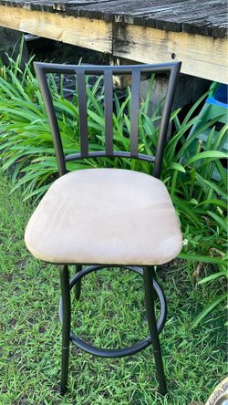 Two suede bar stools