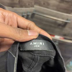 black amri jeans