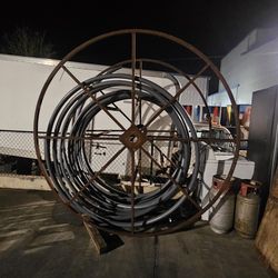 Giant metal spool wheel 46" wide 6ft tall could make great outdoor table