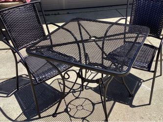 Patio set ,garden set all metal 2 chairs beautiful painted black has a opening for a umbrella …chairs 19.5 deep-  27 long - 33 tall..Table 30X30 -28.5