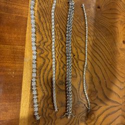 Lot Of 4 Diamond, Gold and Silver Tennis Bracelets