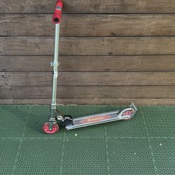 Razor A3 Kick Scooter for Kids Ages 5+ - Larger Wheels, Front Suspension, Wheelie Bar, Lightweight, Foldable, Aluminum Frame, and Adjustable Handlebar