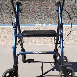 Rolling Walker
​Excellent condition. High-quality, lightweight, and very stable.
 Comfort: Padded seat and backrest with under-seat storage.
 Safety: 