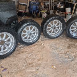 33x12.50xR20LT Ironman Mud-Terrain Tires With 20" XD Series Rims