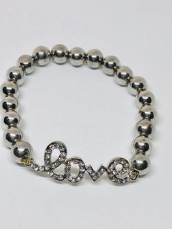 Bracelet with Love center piece with rhinestones with grey faux pearls setting
