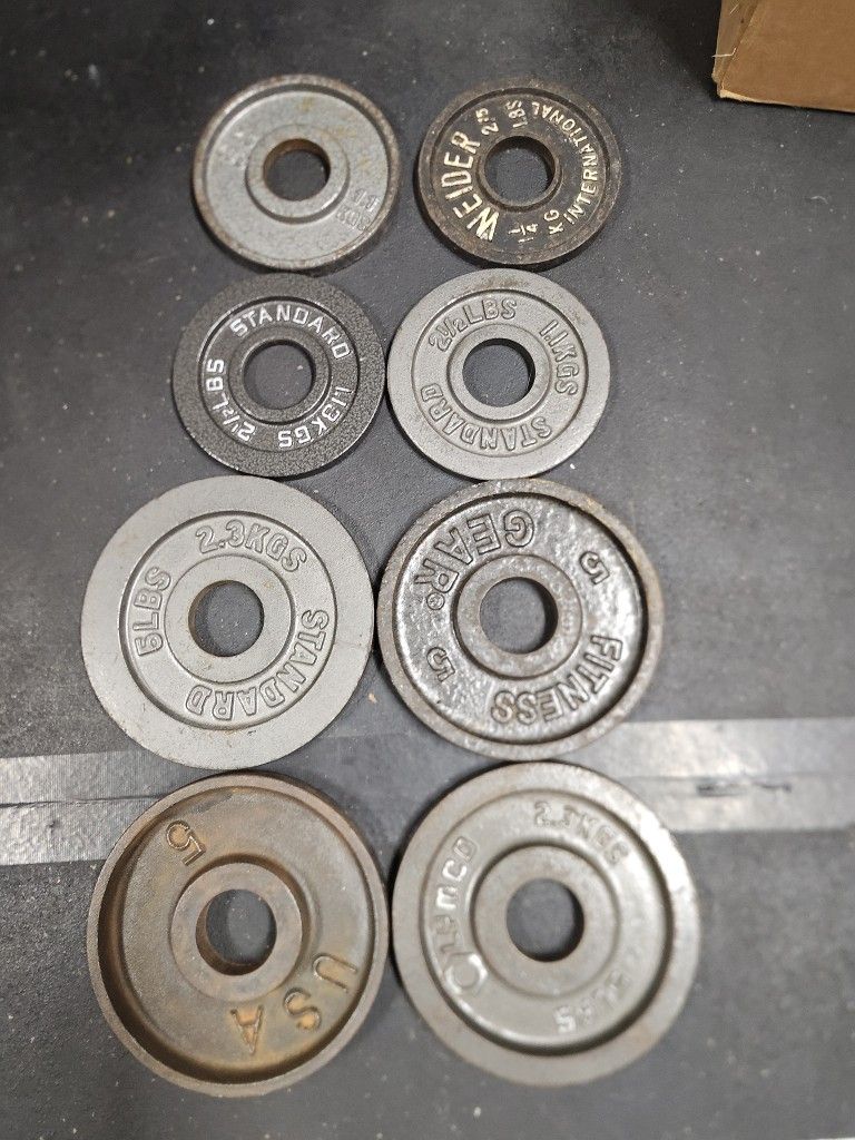 Mismatched 2.5lb And 5lb Olympic Weight Plates-