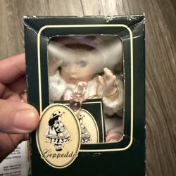 Geppeddo Porcelain Doll