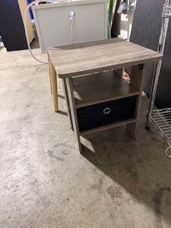 Small wooden table with drawer