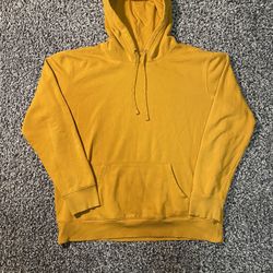 yellow hooded sweatshirt from Goodfellow & Co., sized XL.