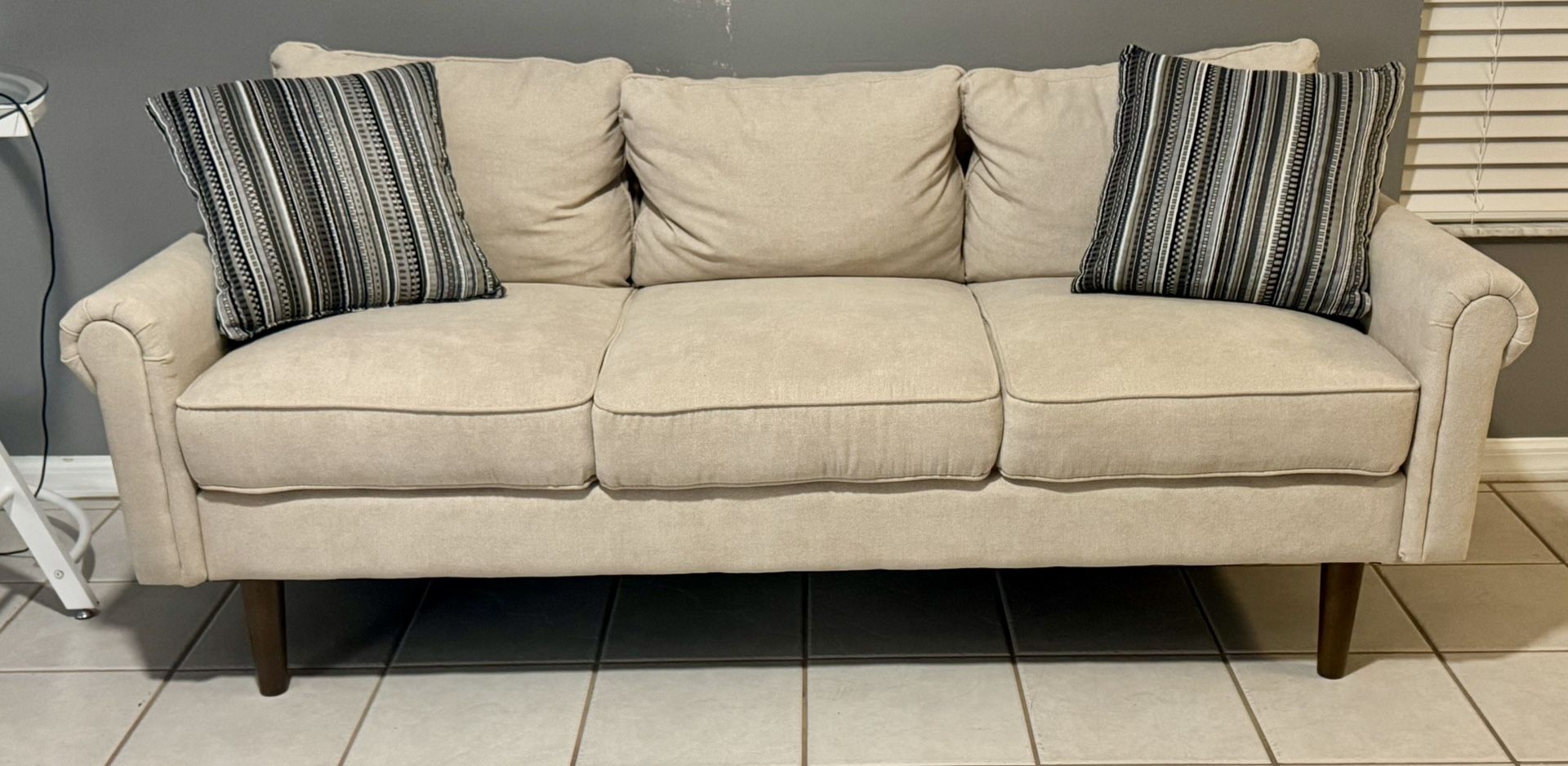 Modern Beige Sofa with Pillows – $110 OBO