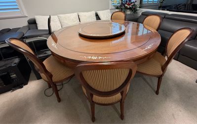 Beautiful 6 feet round table glass top lazy Susan and 5-chairs