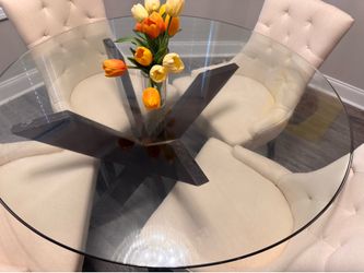 4 chairs and round glass table