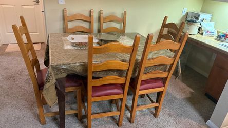 Dinning table with six leather chairs
