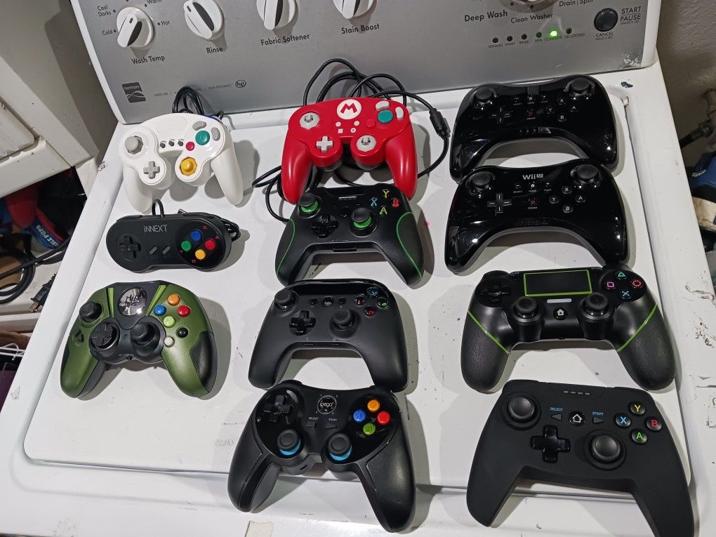 Selling all these controller. they are new,  except the red wii control... I have 3 used controller for ps2, if you want them...