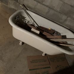 Claw Foot Tub And Vintage Tricycles