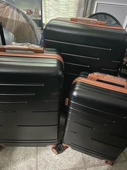 3 piece black luggage set with brown trim