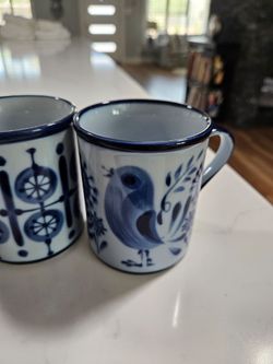Set of four blue coffee or tea mugs