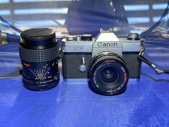 Vintage Canon TX 35mm Film Camera + 2 Lenses (28mm Prime & 35-70mm Zoom) – Tested & Working