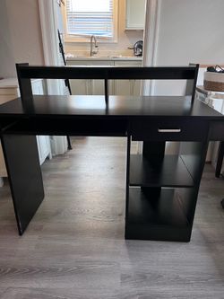 Black desk with shelves