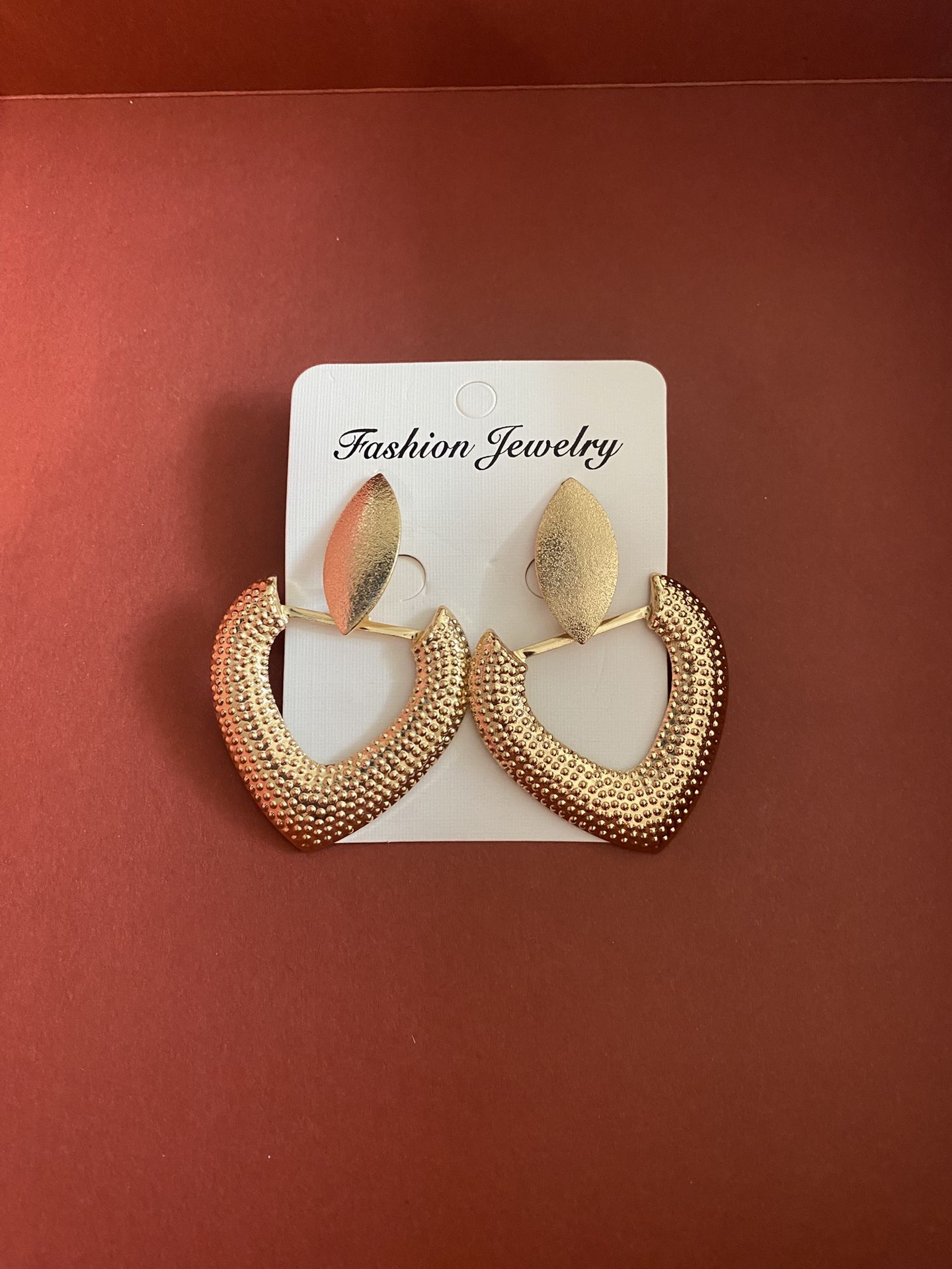 Golden spade earrings