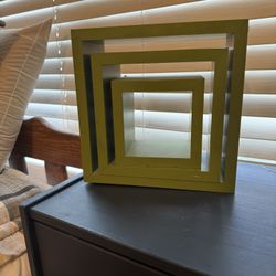 3 green cube shelves