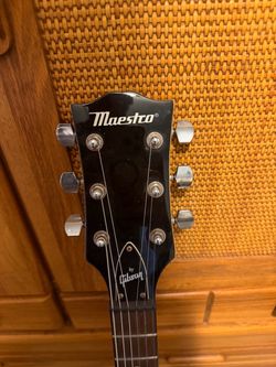 Dean and Gibson electric guitar