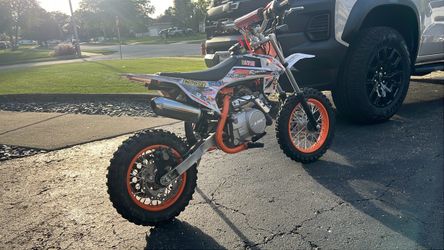 it goes 50Mini Dirt Bike Orange and Whit it goes 55 will trade 🤷‍♂️👀
